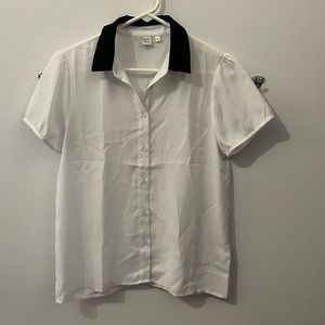 White blouse with black collar